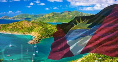 Antigua and Barbuda coastal view with national flag, 2025 citizenship by investment program reforms